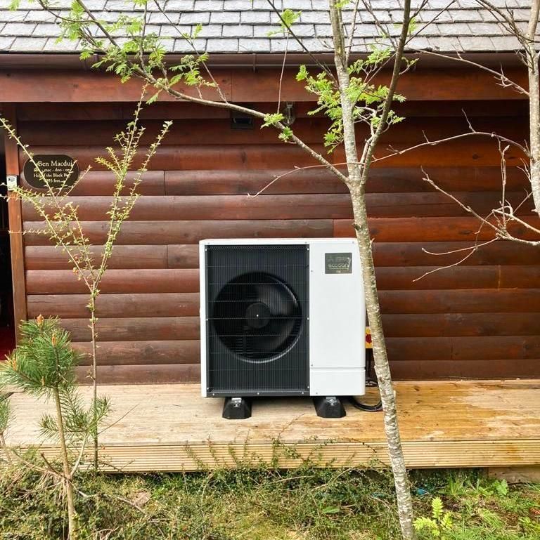 Heat pump installation beside a residential property in Scotland
